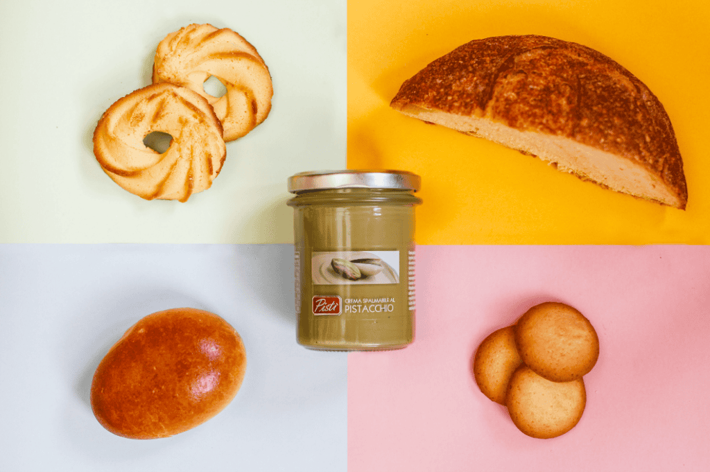 Delicious Sicilian sweets including cookies, bread, and spread from Pistì. Perfect for authentic Ita.
