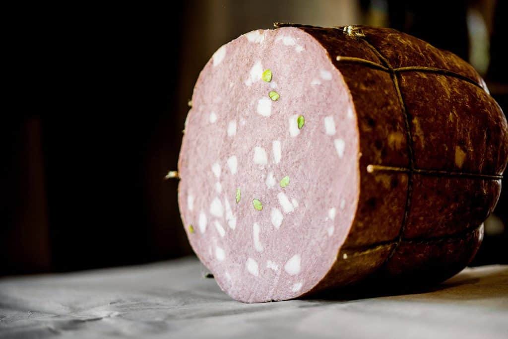 Artisanal pork salami with pistachios.