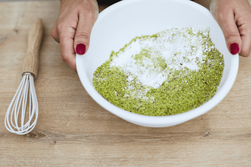 Pistì Sicilian Pistachio Mixture Pistì Sicilian pistachio mixture in a white bowl, ready for dessert preparation.