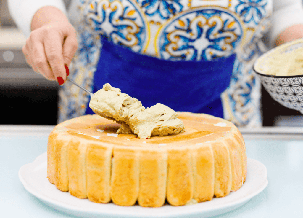 Torta Siciliana artigianale Artisanal Sicilian cake with pistachio filling.