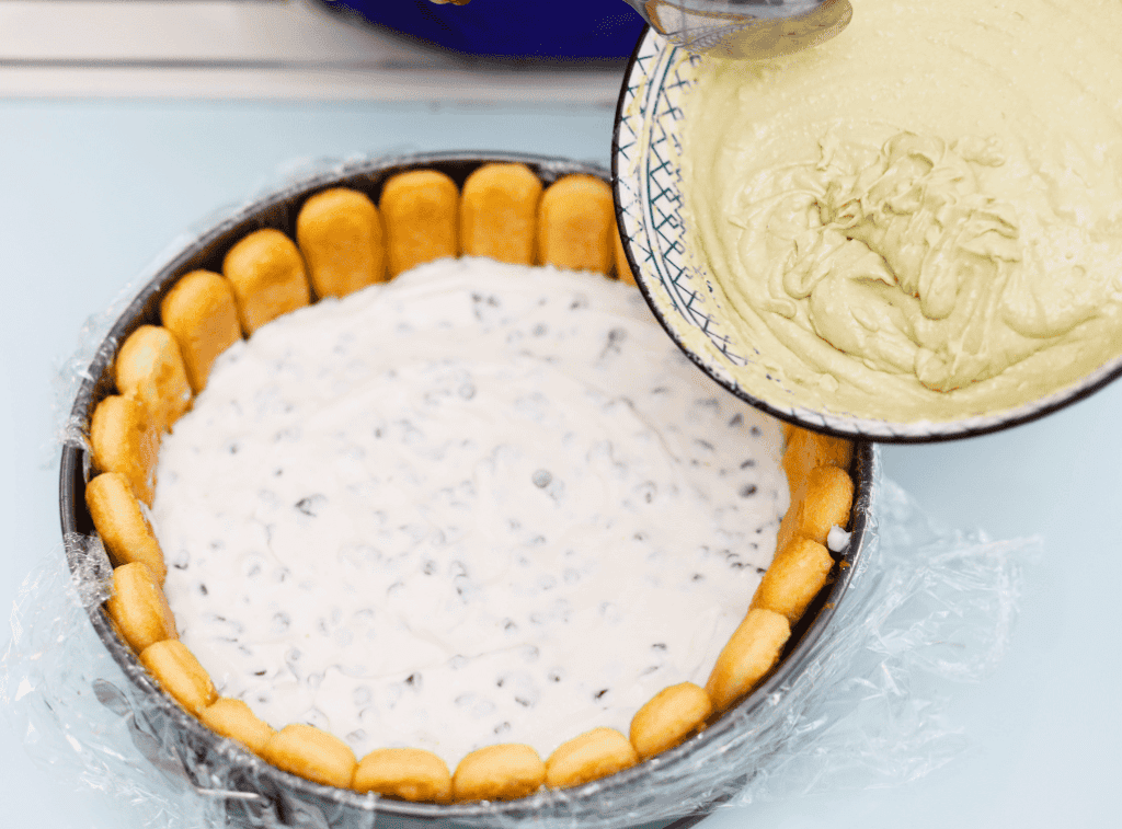 Crema di ricotta e biscotti Ricotta cream with biscuits in a bowl, Sicilian dessert.