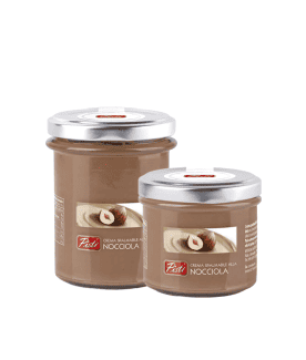 Hazelnut spread in glass jars, rich and smooth.