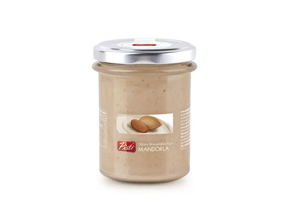 Almond spread in a glass jar with a metal lid, labeled "Pisti" and "Crema Spalmabile Mandorla.".