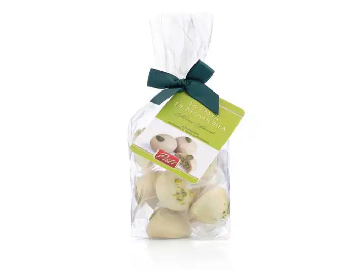 Traditional Sicilian marzipan fruits in a clear gift bag with green label and ribbon.