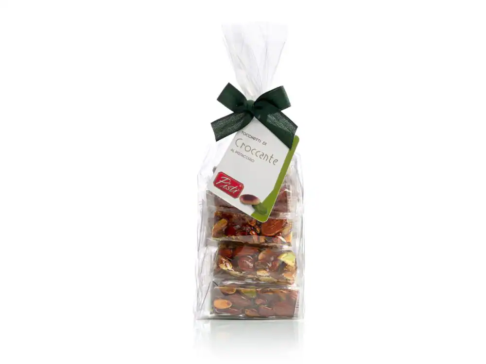 Assorted Sicilian croccante in elegant gift packaging with green ribbon.