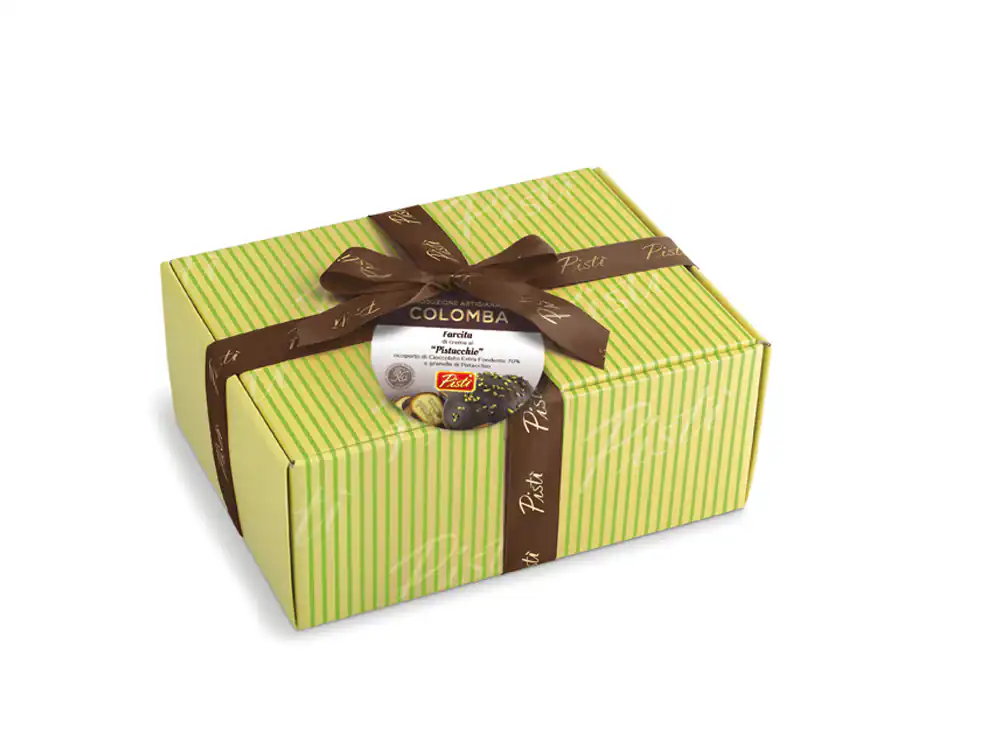 Traditional Sicilian Colomba cake in green packaging with brown ribbon.