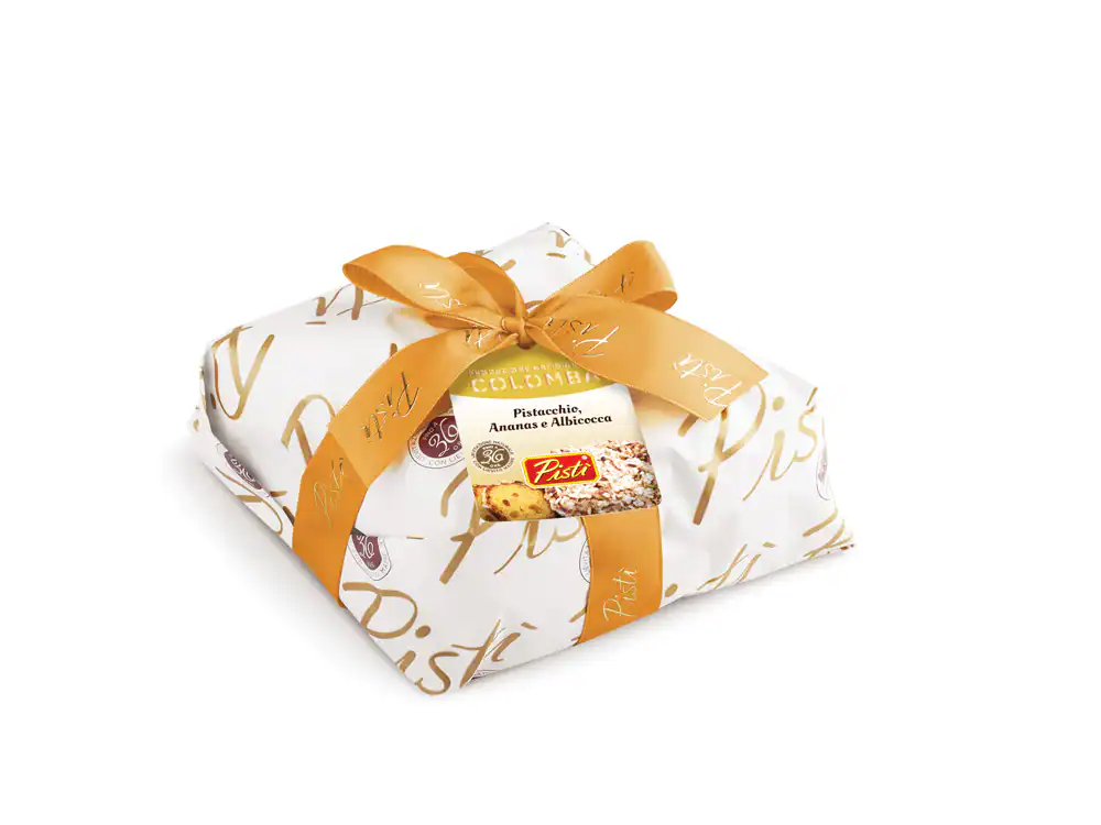 Sicilian artisanal cake wrapped in elegant paper with gold ribbon.