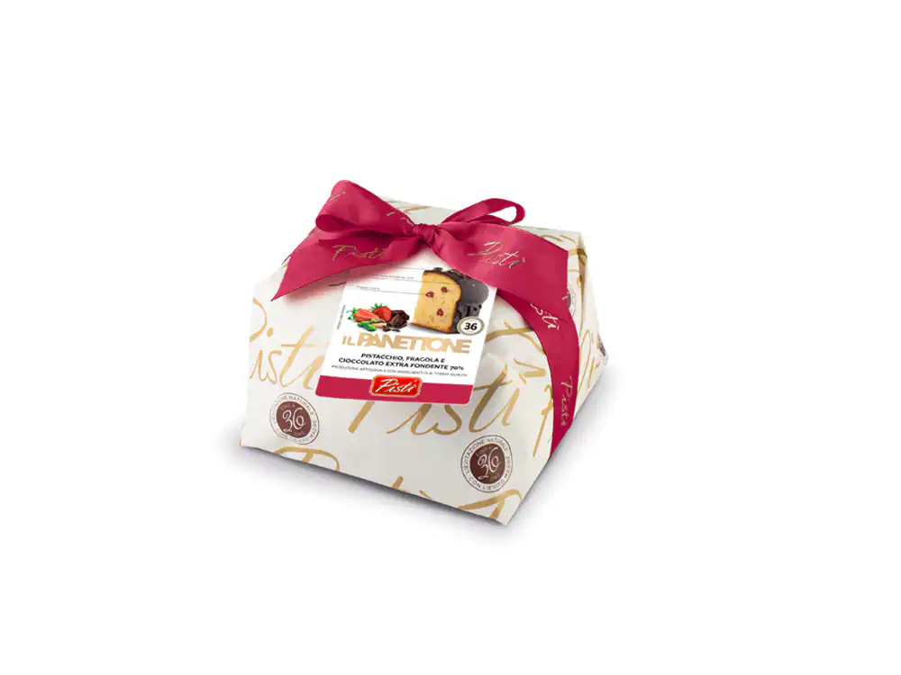 Sicilian artisanal cake wrapped with a pink ribbon, showcasing quality and tradition.