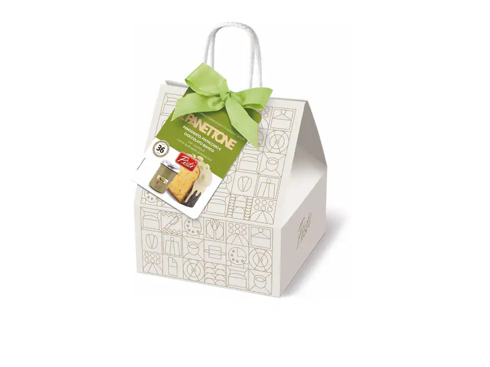 Artisanal Sicilian sweets gift box with green ribbon and tag.