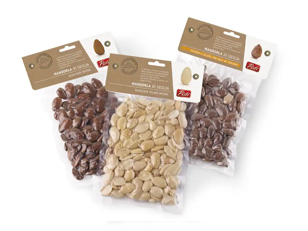 Assorted Sicilian almonds in three flavors, artisanal packaging.