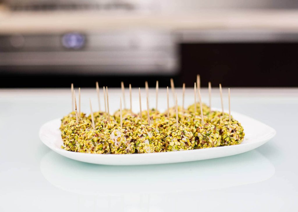 Receta Tartufini de jamón, queso ricotta y pistachos