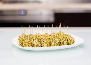 Receta Tartufini de jamón, queso ricotta y pistachos