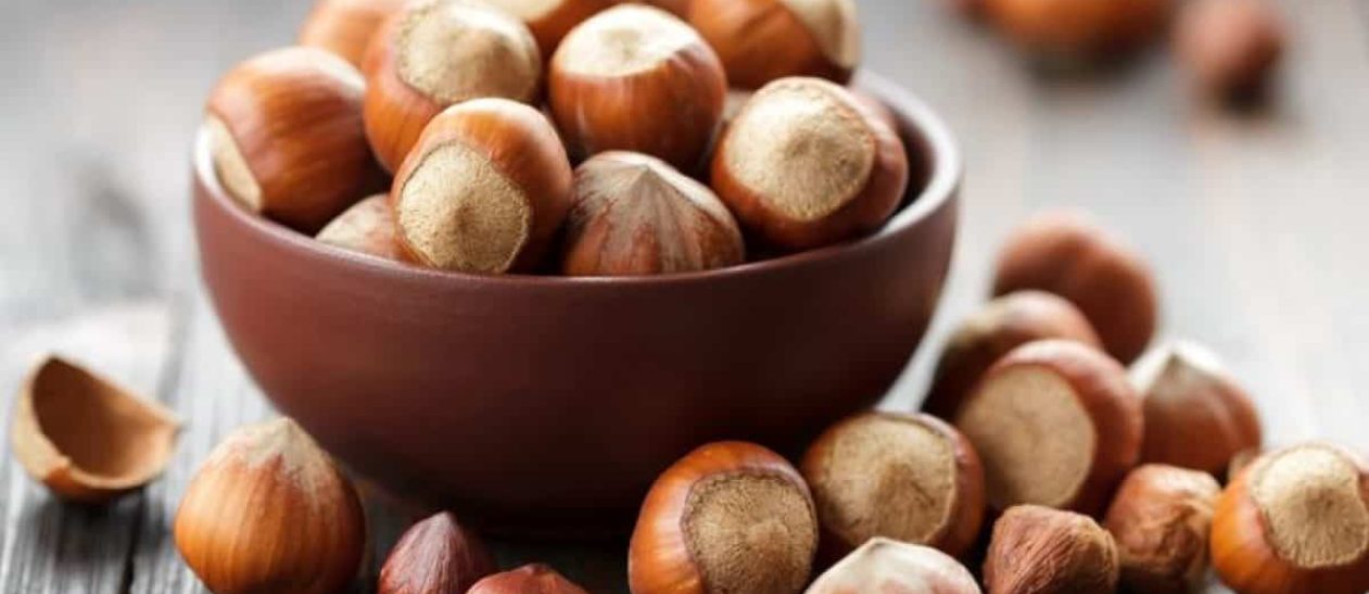 Hazelnuts in a bowl, ready to eat.