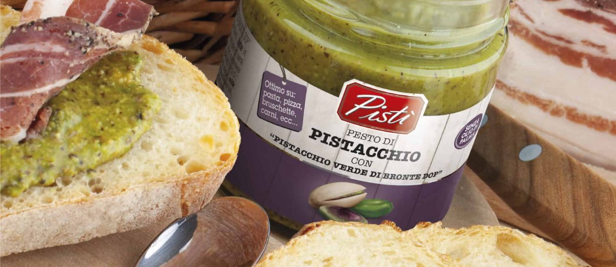 Pistacchio verde di Bronte DOP in jar with bread slices.